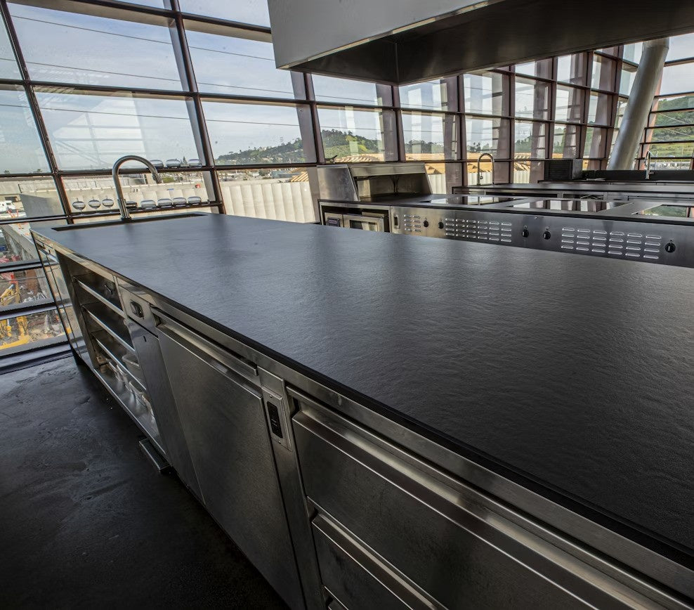Sirius ceramic countertop - textured black Dekton surface with green undertones - view 2