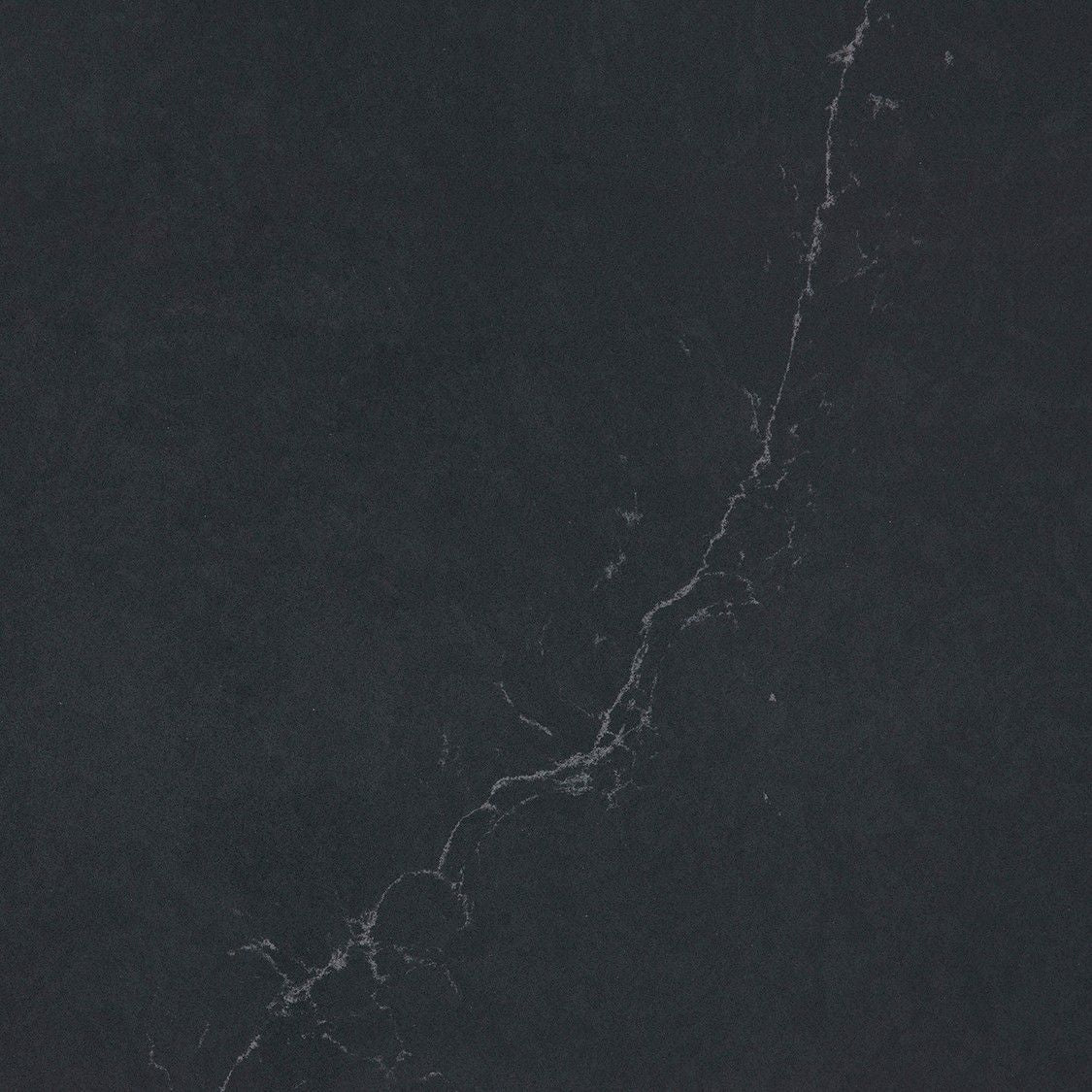 Charcoal Soapstone quartz countertop - blue-grey soapstone effect with grey highlights Silestone surface