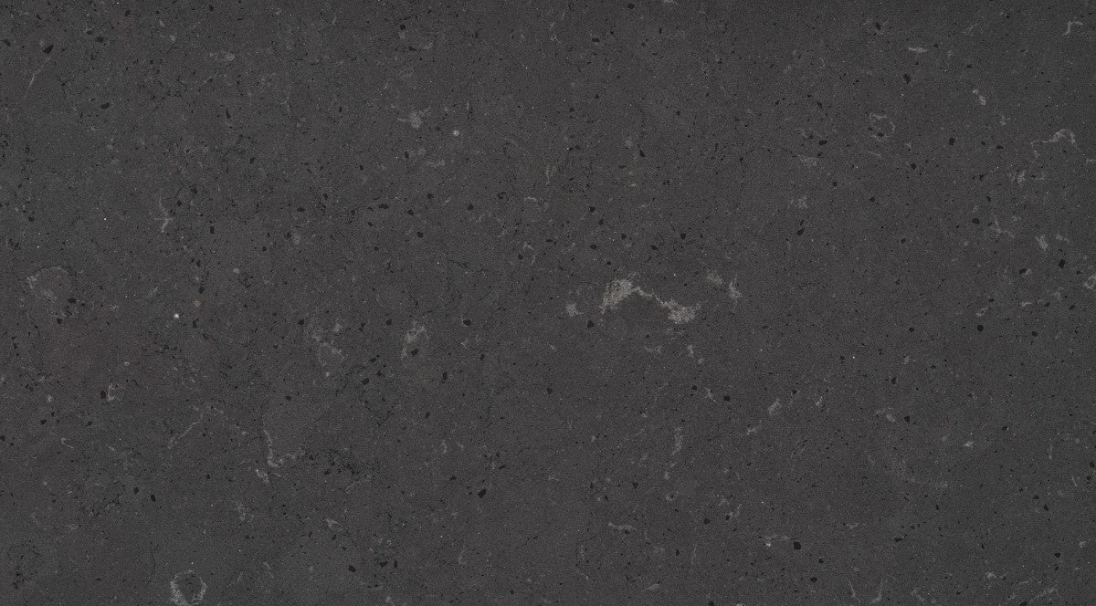 Cinder Craze quartz countertop - dark grained black with white shell veining Silestone surface