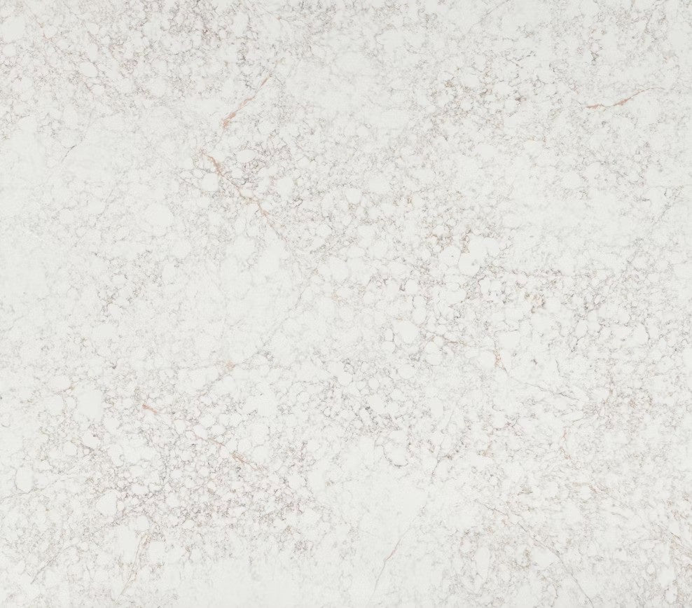 Rivière Rose quartz countertop - warm white with taupe and blush veining Silestone surface